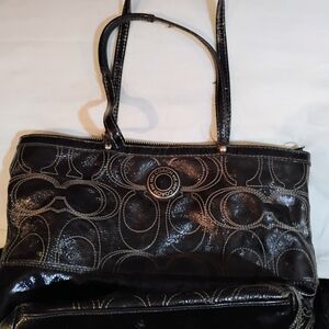 Coach Black Patent Leather Purse with Glossy Finish and Embossed Pattern